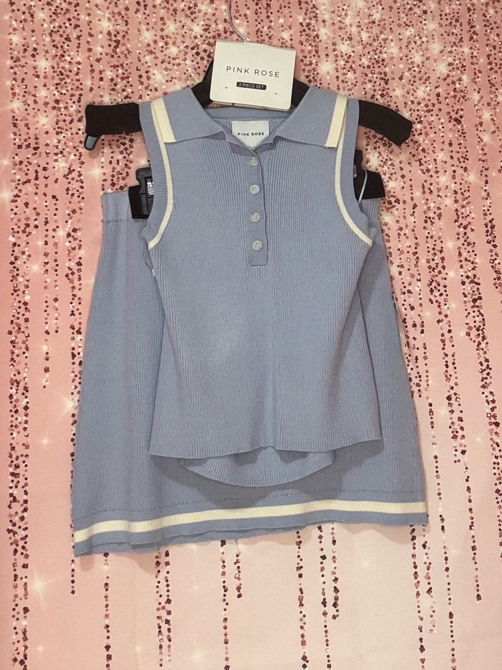 Pink Rose 2-Piece
Knit Skirt and Sleeveless Polo Set in light blue